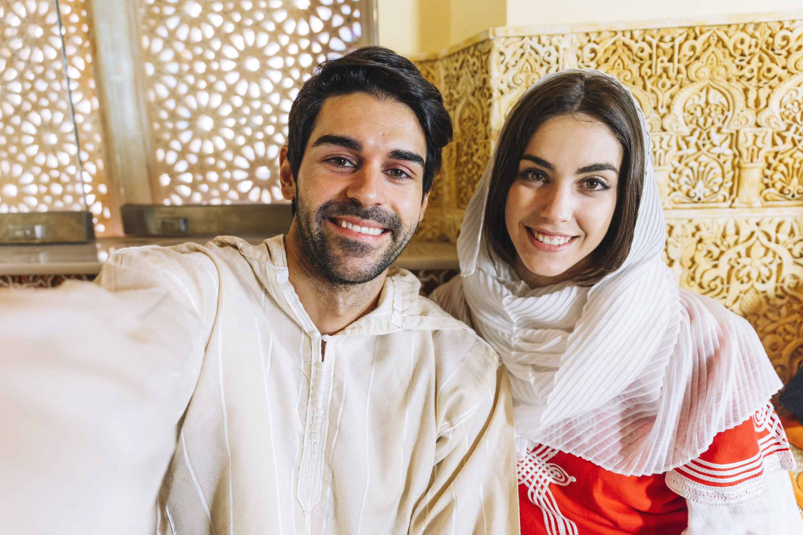 muslim-couple-taking-selfie-restaurant